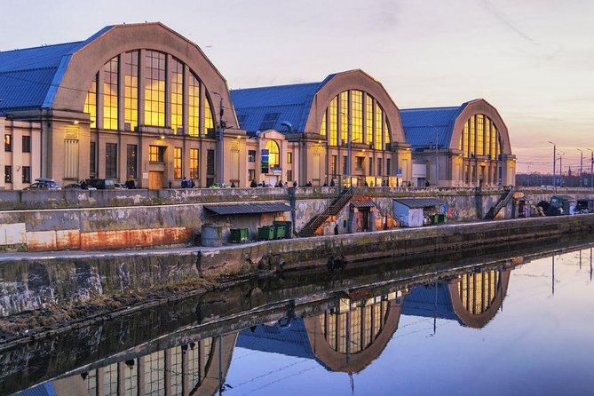 Private grand Riga city tour - Livu Square and the river story under your feet