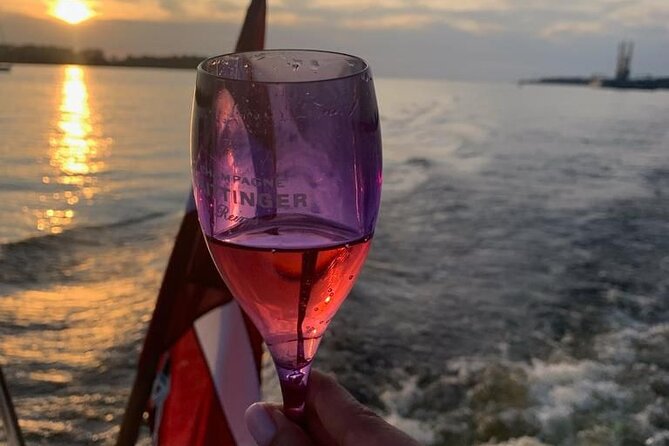 Riga: Evening or Sunset Boat Tour with Drink and Audio Guide - Getting on board at Andrejosta Marina, why the location feels easy
