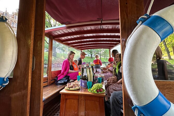 Riga: Evening or Sunset Boat Tour with Drink and Audio Guide - The 50-minute flow: canals first, then open water views