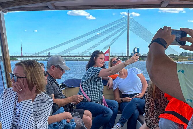 Riga Sightseeing Tour by Canal Boat with Audioguide - Stockmann Tunnel and the New Railway Works (If the Route Allows)