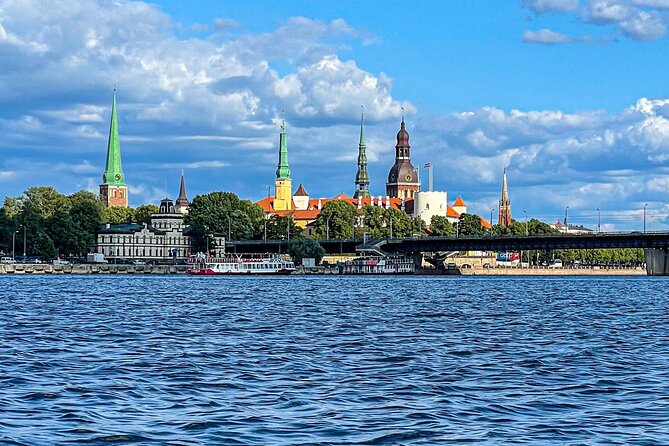 Riga Sightseeing Tour by Canal Boat with Audioguide - Central Market and the National Library: City Function, Not Just Landmarks